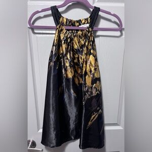 Sleeveless black and gold cowl neck top